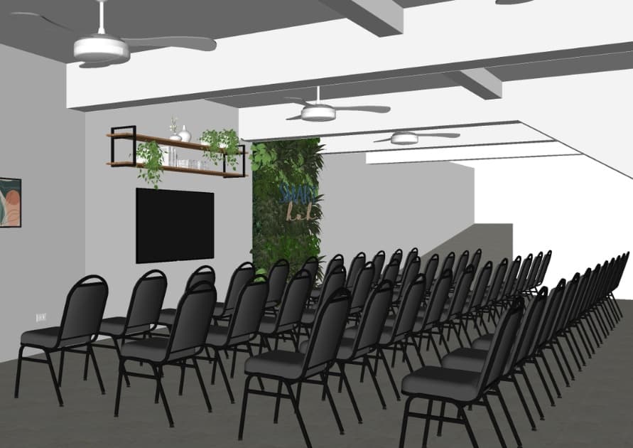 Simulação 3D do lounge da Smart Hub preparado para evento, com fileiras de cadeiras voltadas para a tela e o jardim vertical.